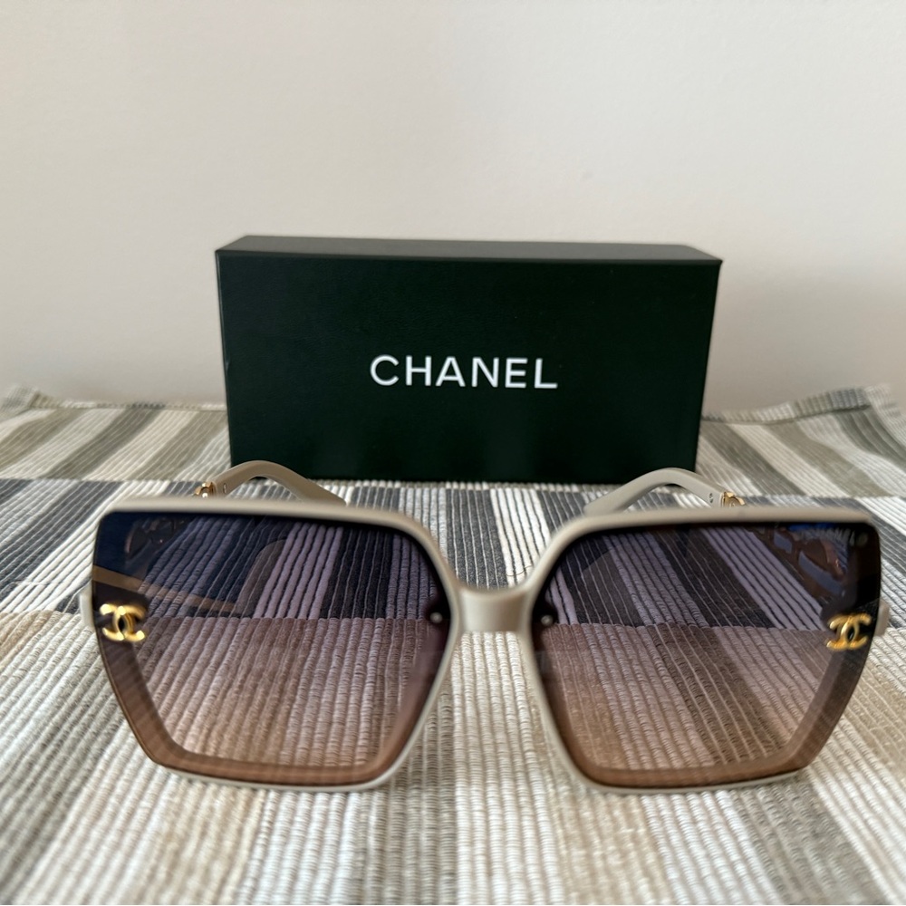 CHANEL Women's Sunglasses with Gold Accents and Brown Gradient Lenses